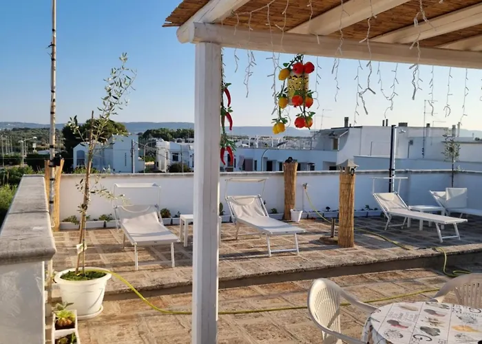 Cala Pescatori Вилланова-ди-Остуни